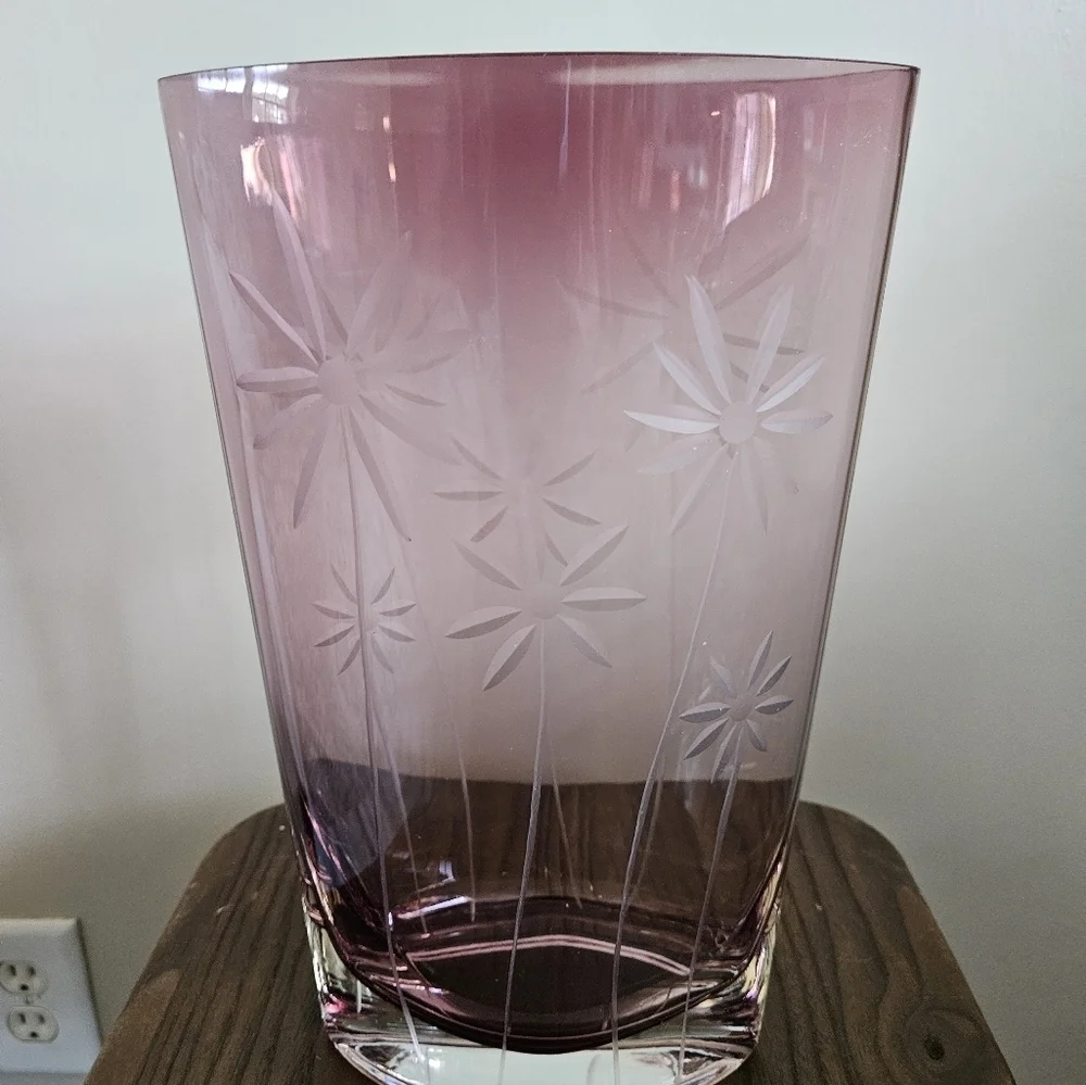 Elegant oval clear cut purple vase.
